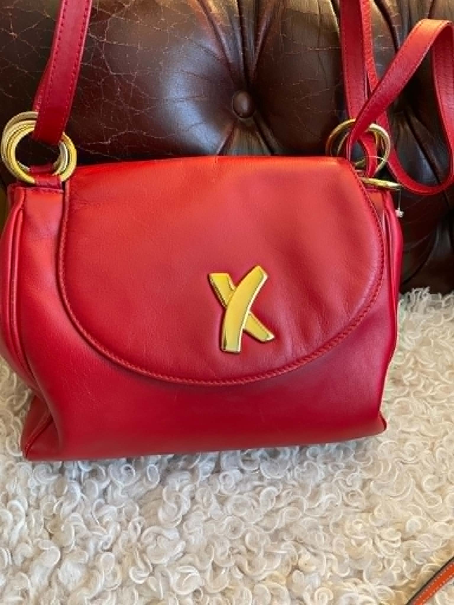 Vintage Paloma Picasso red leather shoulder bag.